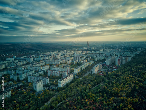 Fototapeta Naklejka Na Ścianę i Meble -  Aerial over the city in autumn at sunset. Kihinev city, Moldova republic of.