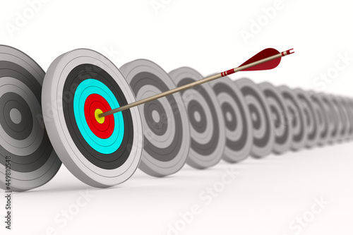 Arrow and target on white b...