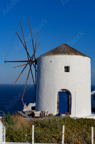 View of famous windmill in Oia,