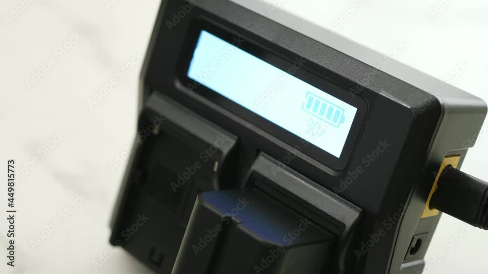 Close up LCD indicator rechargeable lithium battery for a digital camera. Close up LCD indicator rechargeable lithium battery for a digital camera.