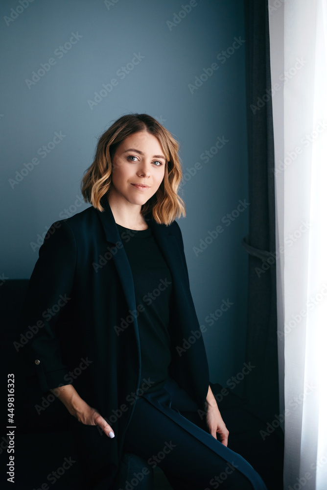 Portrait of confident business woman posing at home Portrait of confident business woman posing at home