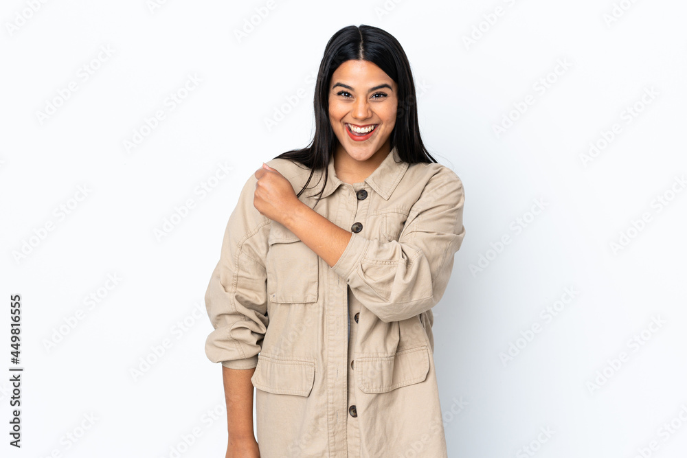 Young latin woman woman isolated on white background celebrating a victory Young latin woman woman isolated on white background celebrating a victory