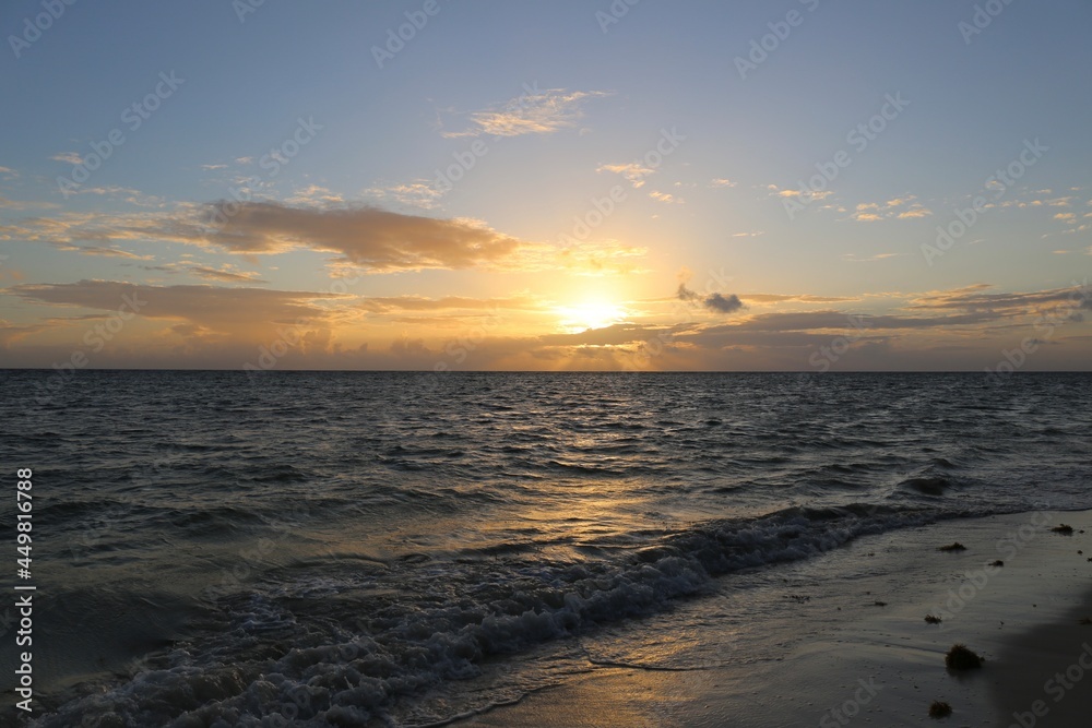 sunset or sunrise  at the beach