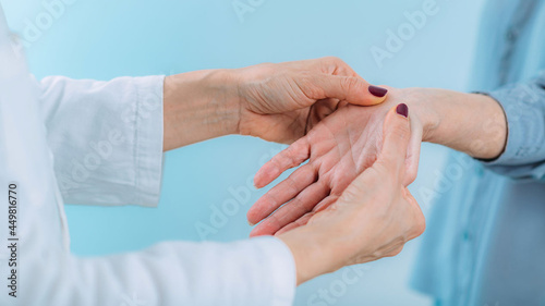 Φωτογραφία Doctor Doing Carpal Tunnel Syndrome Test with a Senior Woman.