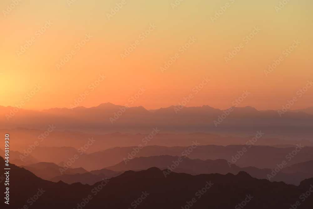 Colorful sunrise in mountains.