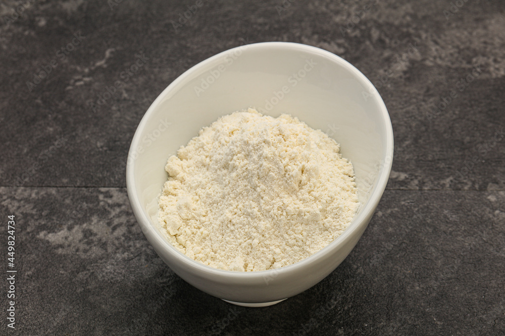 Wheat flour heap in the bowl Wheat flour heap in the bowl