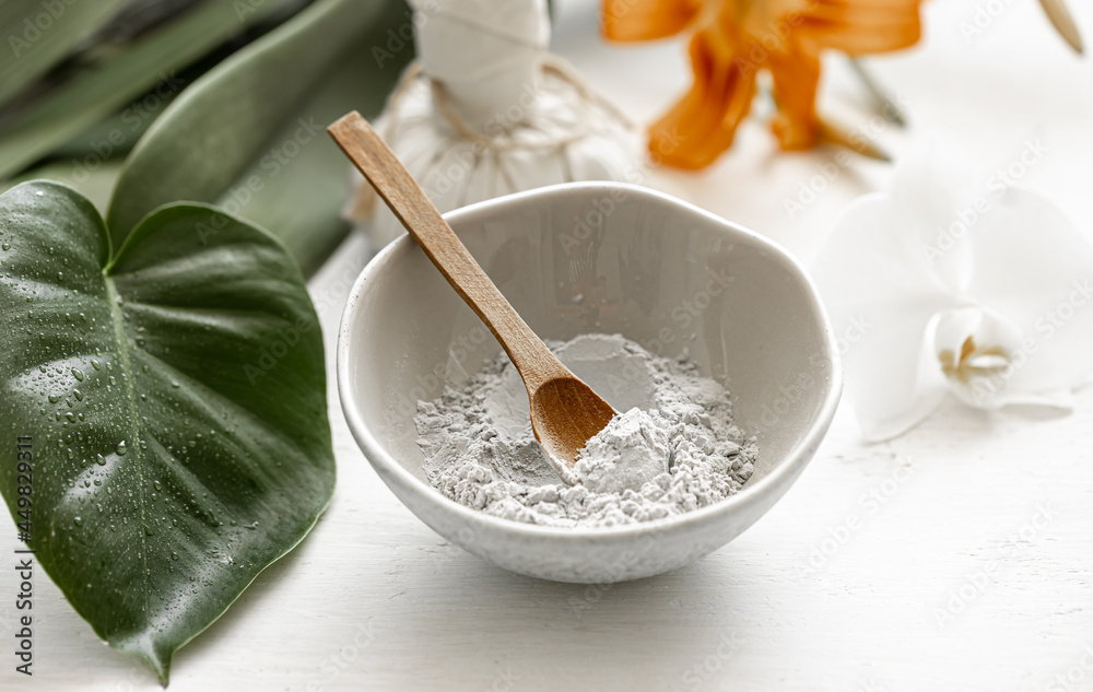 Fototapeta premium Spa composition with powder face mask and flowers.