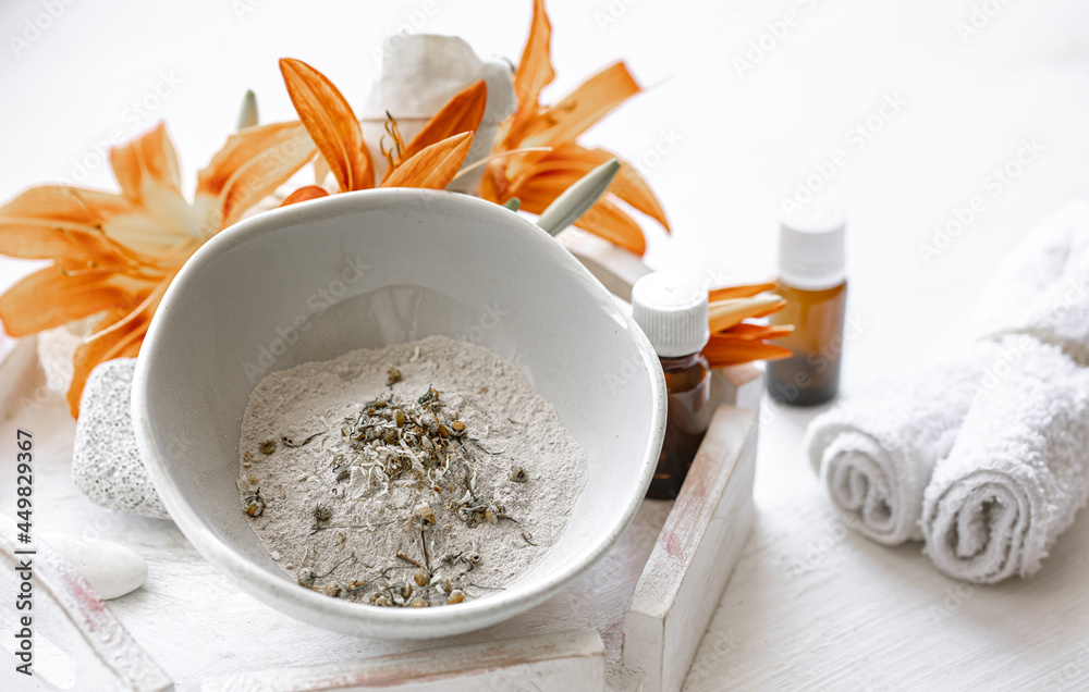 Spa composition with powder face mask and natural oils. Spa composition with powder face mask and natural oils.