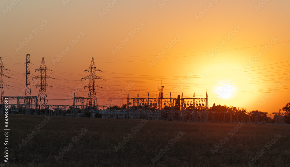 Beautiful sunset over the power plant. Electrical power background.