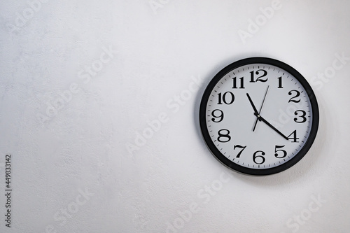 wall clock on white abstract texture background