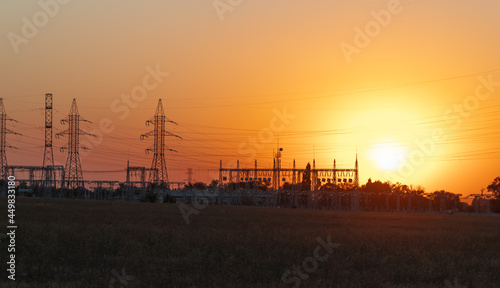 Beautiful sunset over the power plant. Electrical power background.
