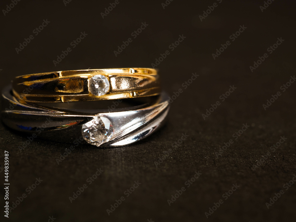 Close up shoot of gold wedding ring with beautiful diamond Close up shoot of gold wedding ring with beautiful diamond