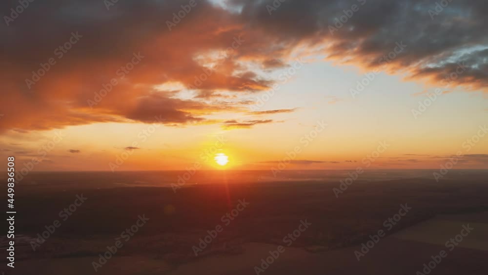 Aerial View Of Sunshine Bright Dramatic Sky. Scenic Colorful Sky At Dawn. Sunset Sky Above Autumn Field And Meadow, Forest Landscape In Evening. Top View From High Attitude. Hyperlapse Aerial View Of Sunshine Bright Dramatic Sky. Scenic Colorful Sky At Dawn. Sunset Sky Above Autumn Field And Meadow, Forest Landscape In Evening. Top View From High Attitude. Hyperlapse