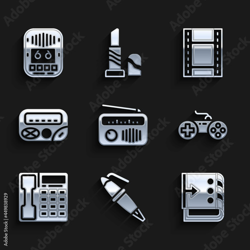 Set Radio with antenna, Fountain pen nib, Sound mixer controller, Gamepad, Telephone handset, Pager, Play Video and Cassette tape player icon. Vector photo