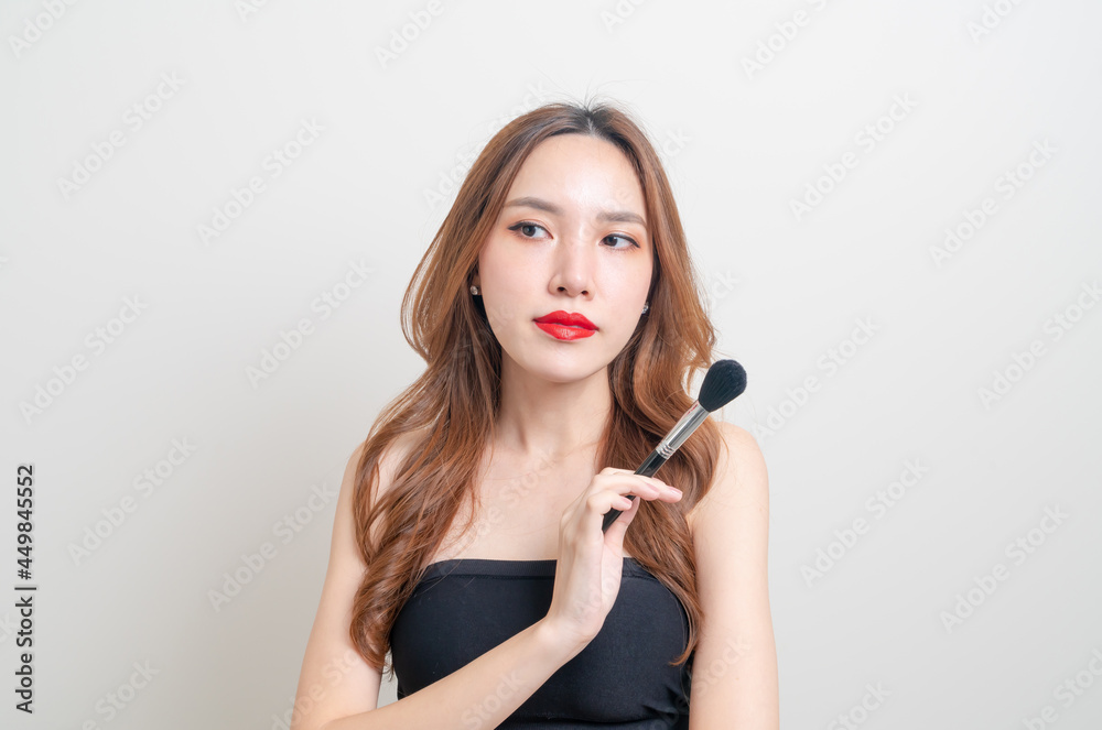 portrait beautiful woman with makeup brush portrait beautiful woman with makeup brush