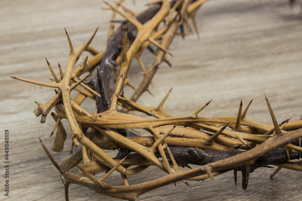 Fototapeta premium A thorn crown on a wooden table. 