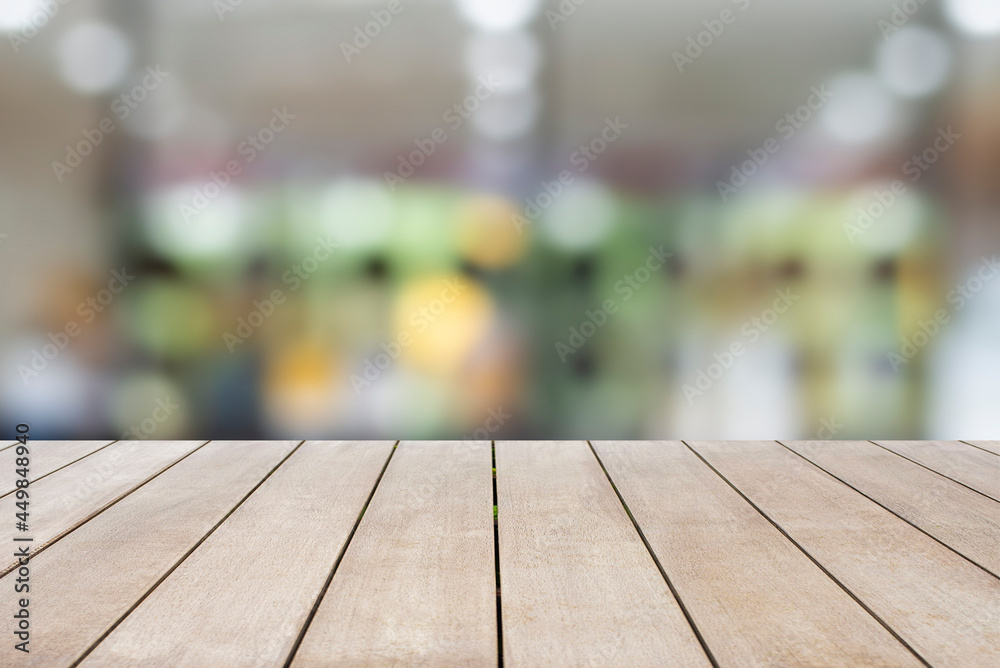Empty old wooden table with blur and bokeh of light in cafe and restaurant background. Can be used for your photo montage. Space for placing items on the table, Mock up for display of product. Empty old wooden table with blur and bokeh of light in cafe and restaurant background. Can be used for your photo montage. Space for placing items on the table, Mock up for display of product.