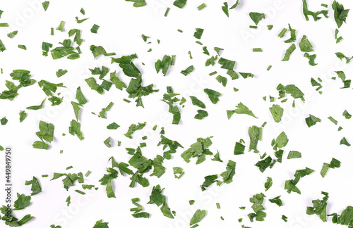 Fresh green chopped parsley leaves isolated on white background and texture, top view  © dule964