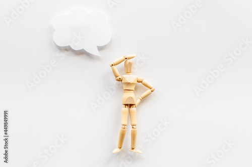 Idea concept. Wooden man figure with speech bubble banner
