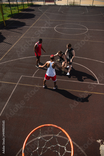 High angle view of multiethnic sportsmen playing basketball © LIGHTFIELD STUDIOS