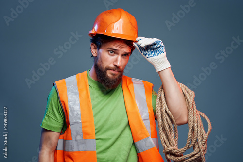 man orange helmet on the head industry isolated background © SHOTPRIME STUDIO