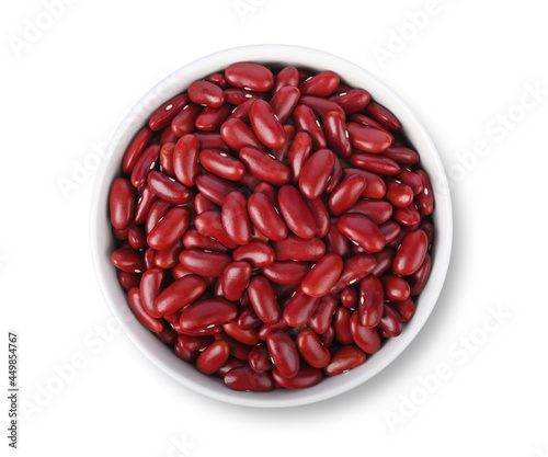 Red kidney beans in ceramic bowl isolated on white background. Top view