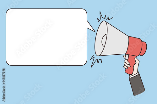 Communication, announcement and public advertisement concept. Human hand holding megaphone speaker with mockup copy space white bubble speech vector illustration 
