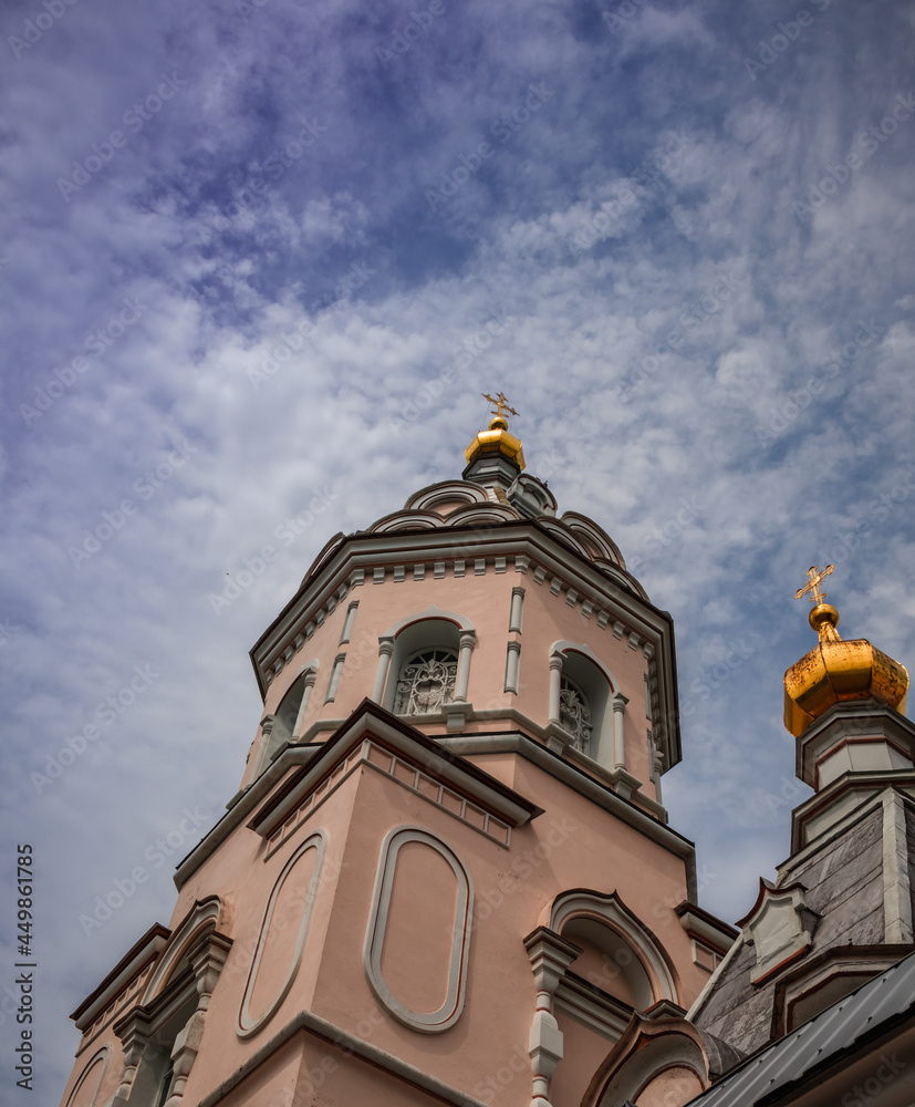 Side view of the Koretsky Convent against the background of a cloudy sky. Ukraine.