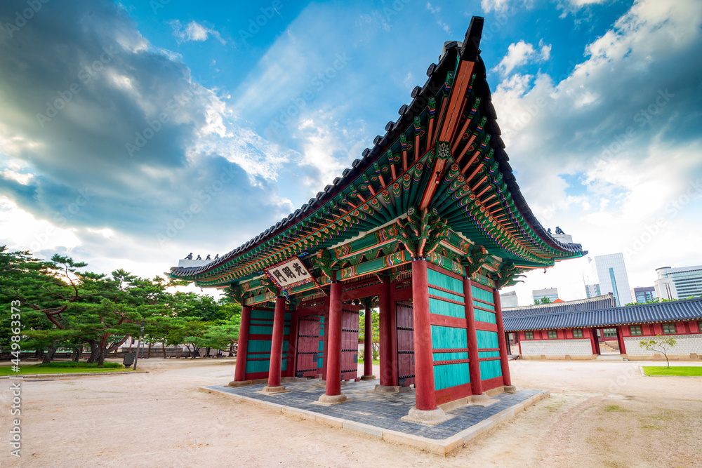 Wide angle view of Gwangmyeongmun Gate in Deoksugung Palace, translation of inscription means Gwangmyeongmun, the name of the gate. Seoul, South Korea.