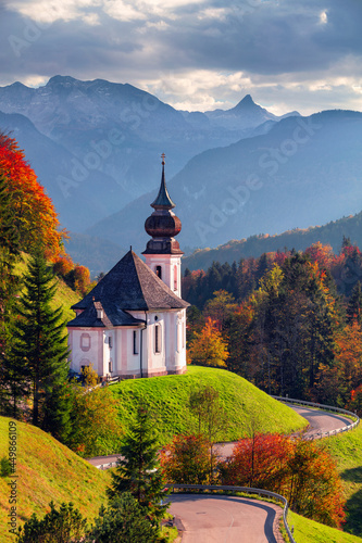 Obraz na płótnie Autumn in Bavarian Alps. Landscape image of the Bavarian Alps with Maria Gern Church and Watzmann mountain during beautiful autumn sunset. w salonie