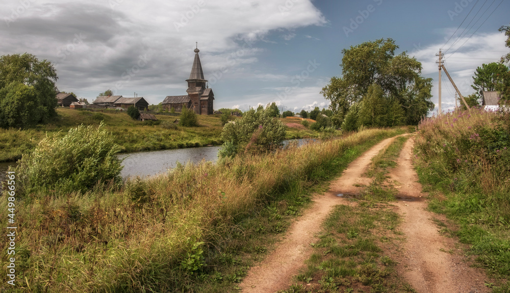 Old traditional northern church of Elijah the Prophet in the Russian village of Saminsky Pogost, Vologda region, Russia Old traditional northern church of Elijah the Prophet in the Russian village of Saminsky Pogost, Vologda region, Russia