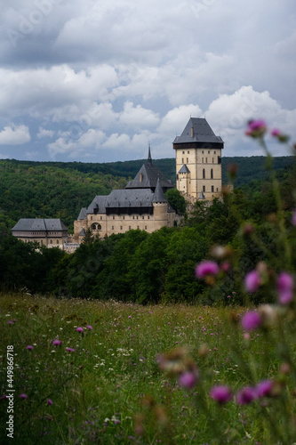 Karlstejn Castle, historical building of the Czech Republic in the summer blooming scenery. Popular tourist destination/attraction near Prague.