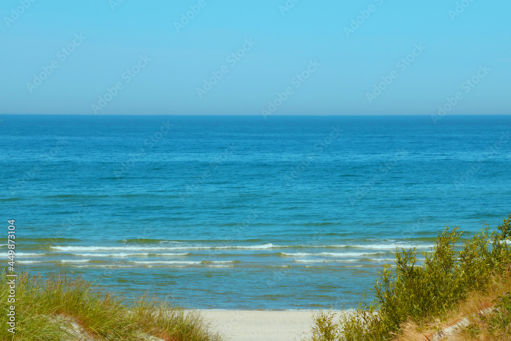 Beautiful turquoise water on the beach on a sunny day. Beautiful turquoise water on the beach on a sunny day.