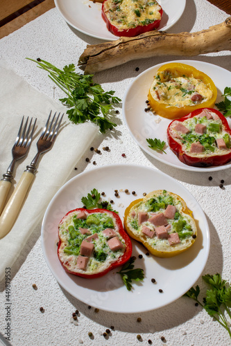 Food photo of breakfast protein omelet in rings with pepper with broccoli and ham filling