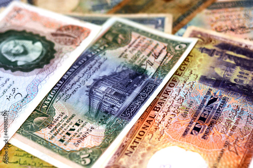 Selective focus of old Egyptian pounds money banknotes background at the time of the Kingdom of Egypt and Sudan, Old Egyptian money, vintage retro photo