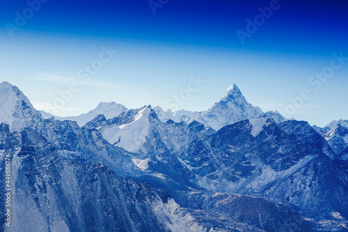 beautiful view of mount Ama Dablam with beautiful sky on the way to Everest base camp, Khumbu valley, Sagarmatha national park, Everest area, Nepal © olyphotostories