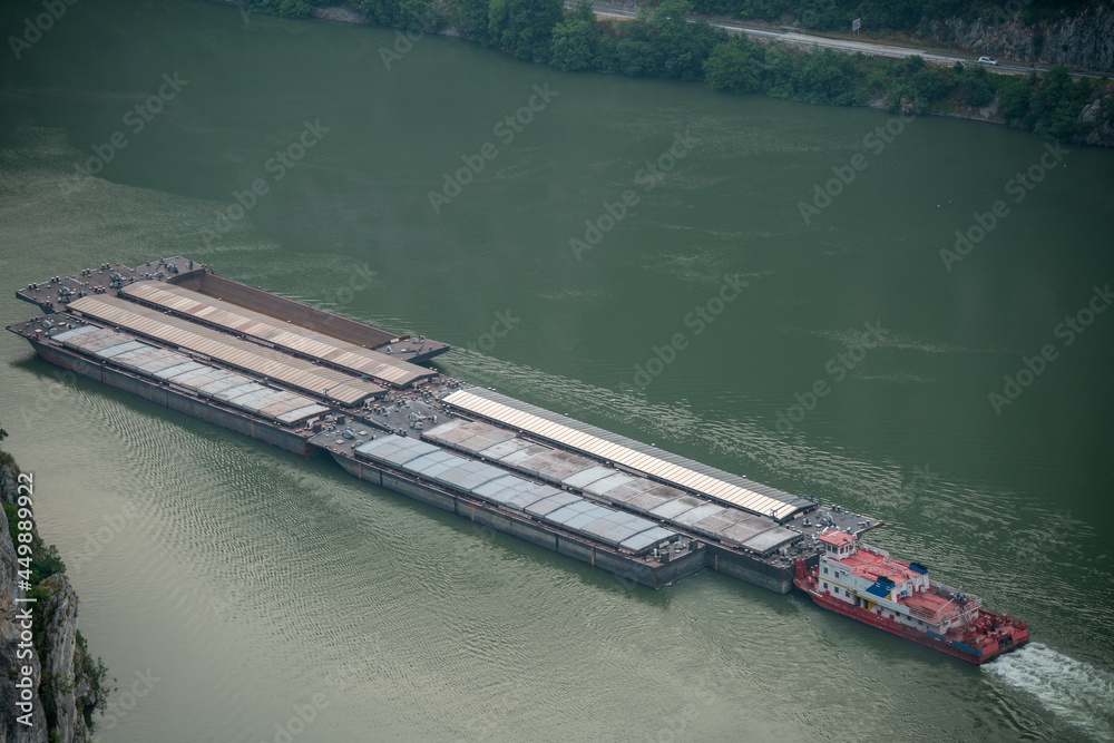 Barges Transport flowing Danube breakthrough, known as the Iron Gates