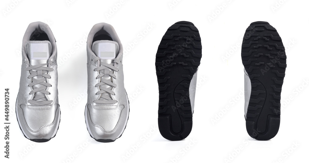 front and sole of sneakers on white background front and sole of sneakers on white background