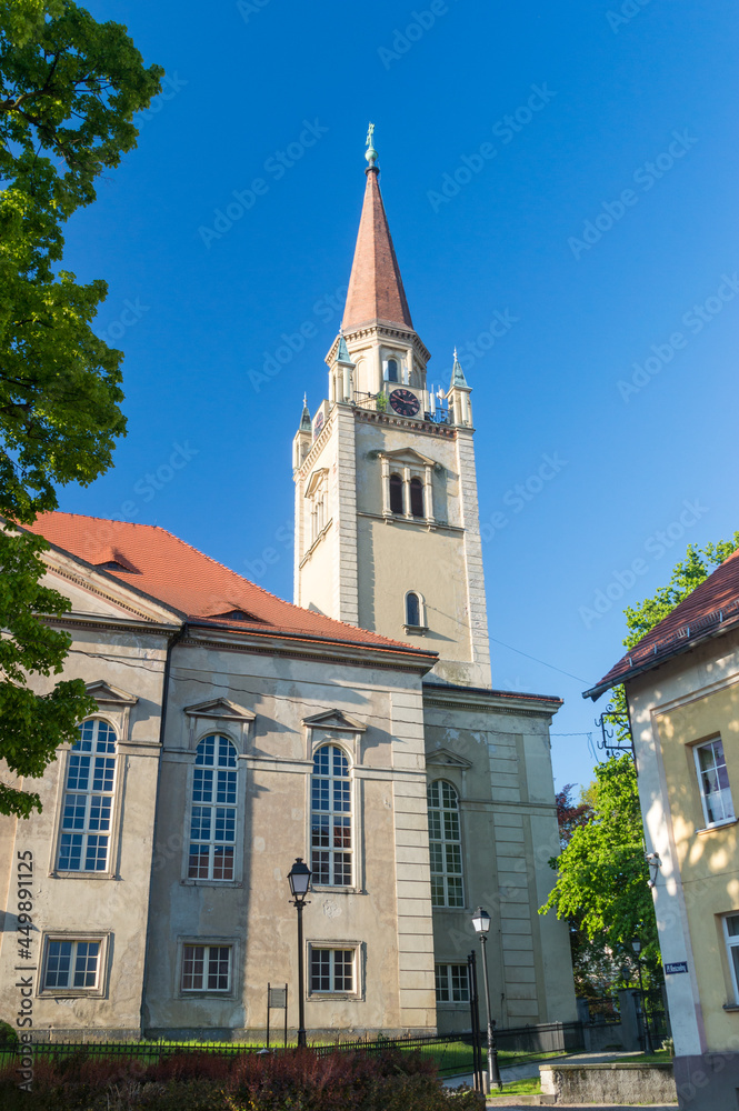 Tower of Evangelical-Augsburg Church of the Savior on blue sky in Walbrzych, Poland. Tower of Evangelical-Augsburg Church of the Savior on blue sky in Walbrzych, Poland.