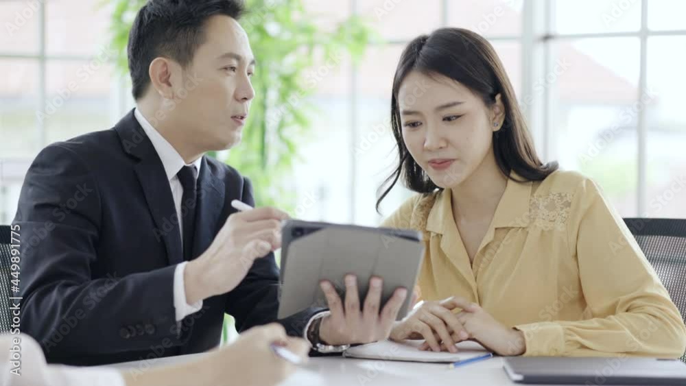 Team Asian businessman active discussing work strategy planning meeting with colleagues. Investment Consulting with Confidence of an Advisor. handshake sign contract between organization.
