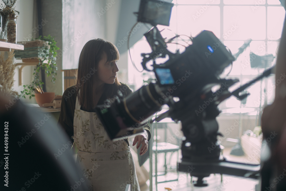 Director at work on the set. Shooting shift, equipment and group. Modern photography technique. Director at work on the set. Shooting shift, equipment and group. Modern photography technique.