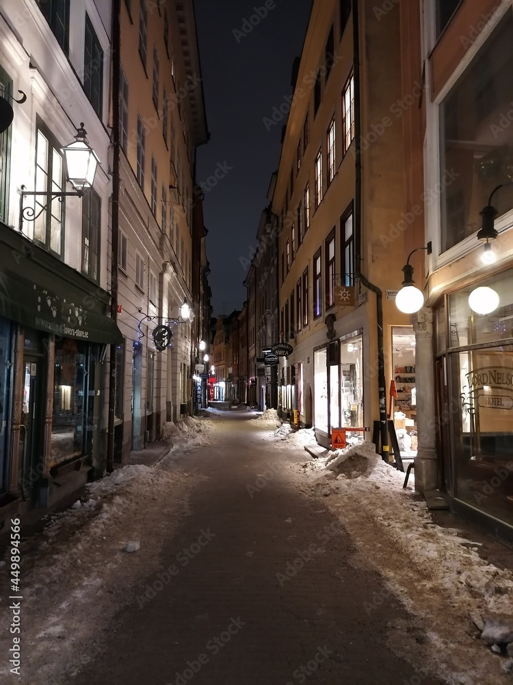 The snowy empty narrow streets of Gamla Stan in the Old Town of Stockholm during winter