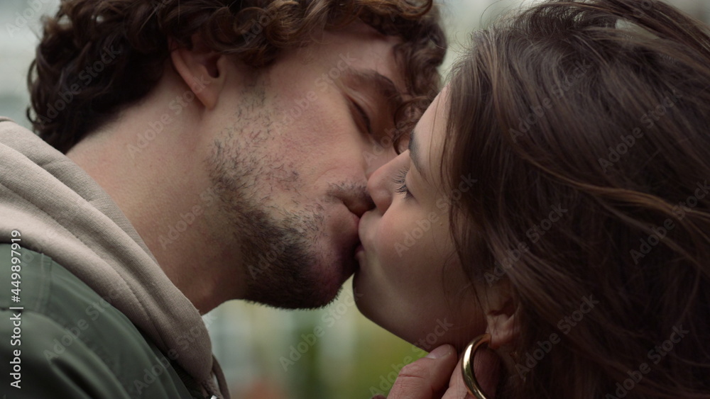 Sexy couple kissing in city center. Affectionate lovers felling happy outdoor. Sexy couple kissing in city center. Affectionate lovers felling happy outdoor.