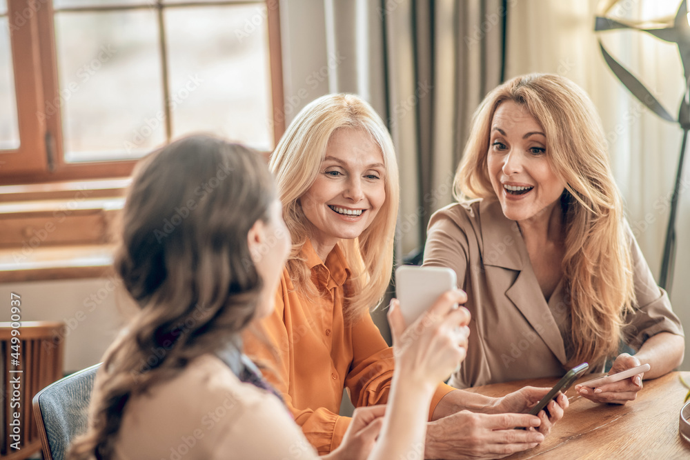Group of women spending time together and feeling excited Group of women spending time together and feeling excited