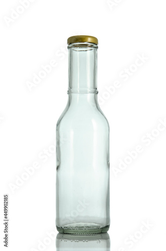 Wallpaper Mural Clear Glass Bottle With gold Lid isolated on white background Suitable for Mockup creative graphic design Torontodigital.ca