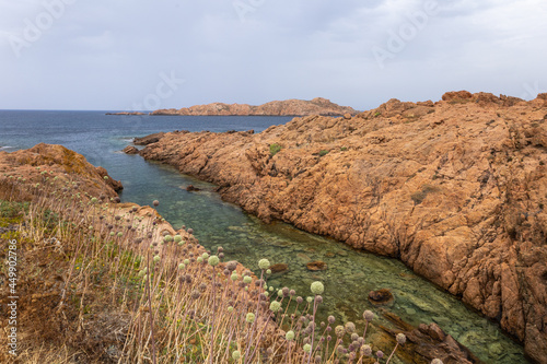 beautiful beach and characteristic reddish rocks of Isola Rossa,  Paradiso. Trinit?� d'Agultu e Vignola, Sardinia, Italy, Europe photo