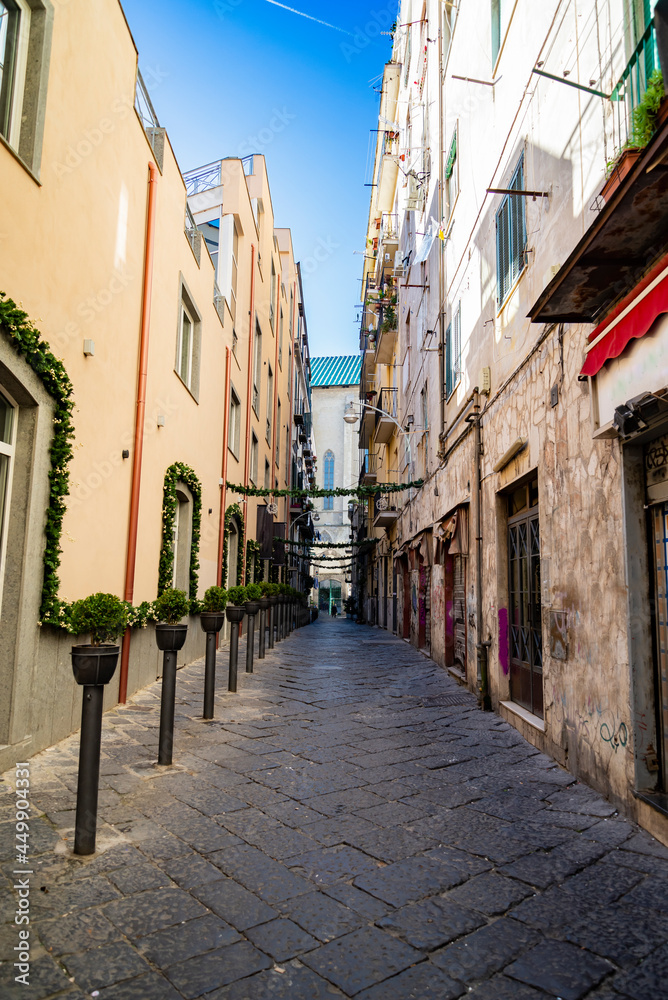 narrow streets of historical old town in italian naples.