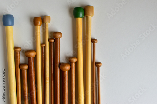 collection of wooden knitting needles 