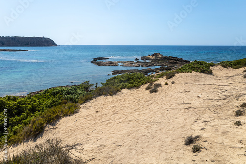 Sa Mesa Longa beach with a long, flat, surfacing rock that forms a long table (sa mesa).Capo Mannu, San Vero Milis, Oristano, Sardinia, Italy, Europe photo