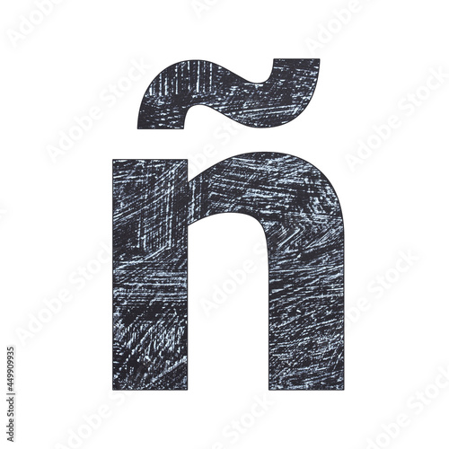 Lowercase letter ñ of the alphabet written with chalk photo